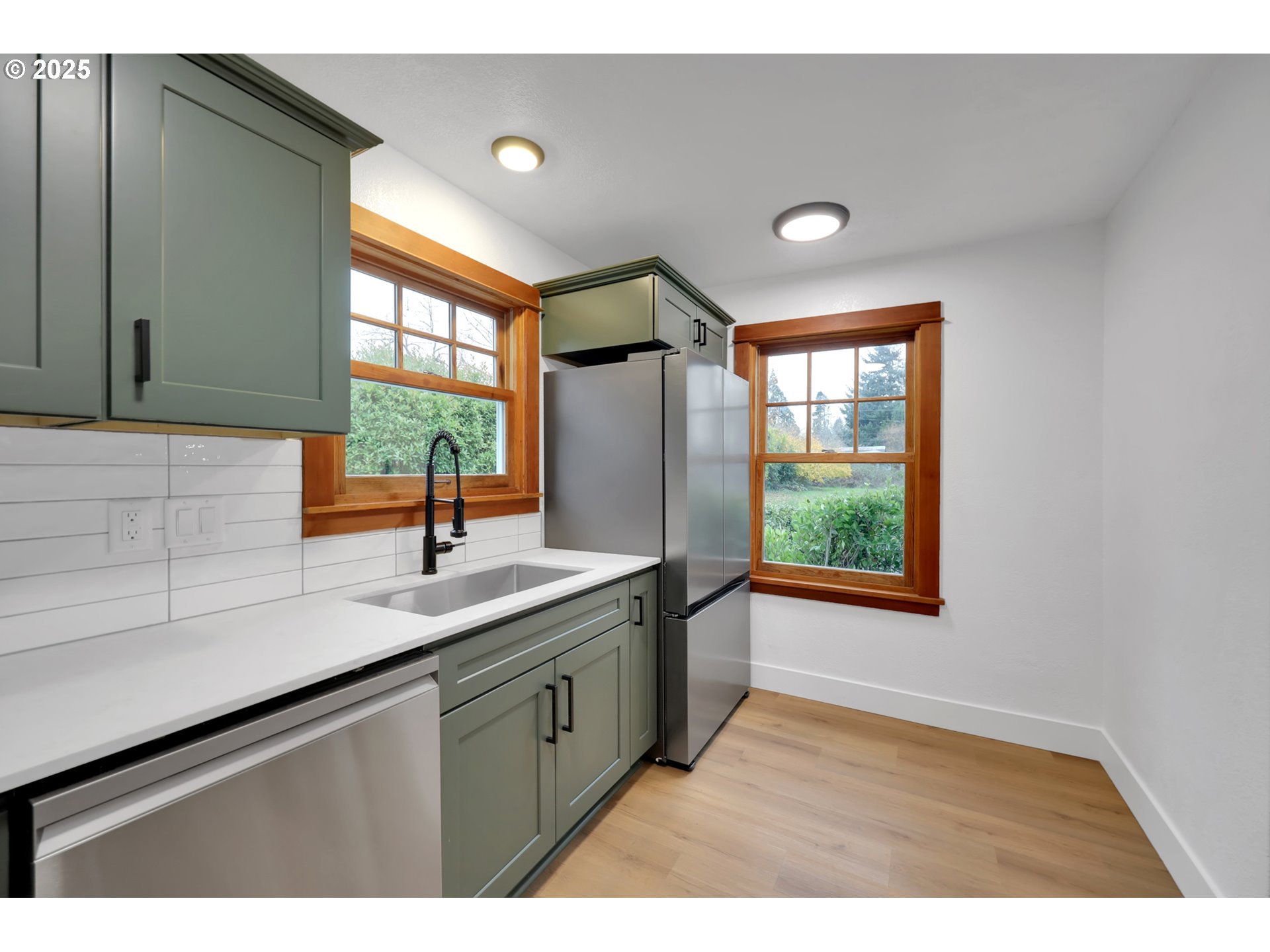 2121 Jefferson Street Eugene, OR 97405 - Photo 11 of 35 a kitchen with a sink and a window