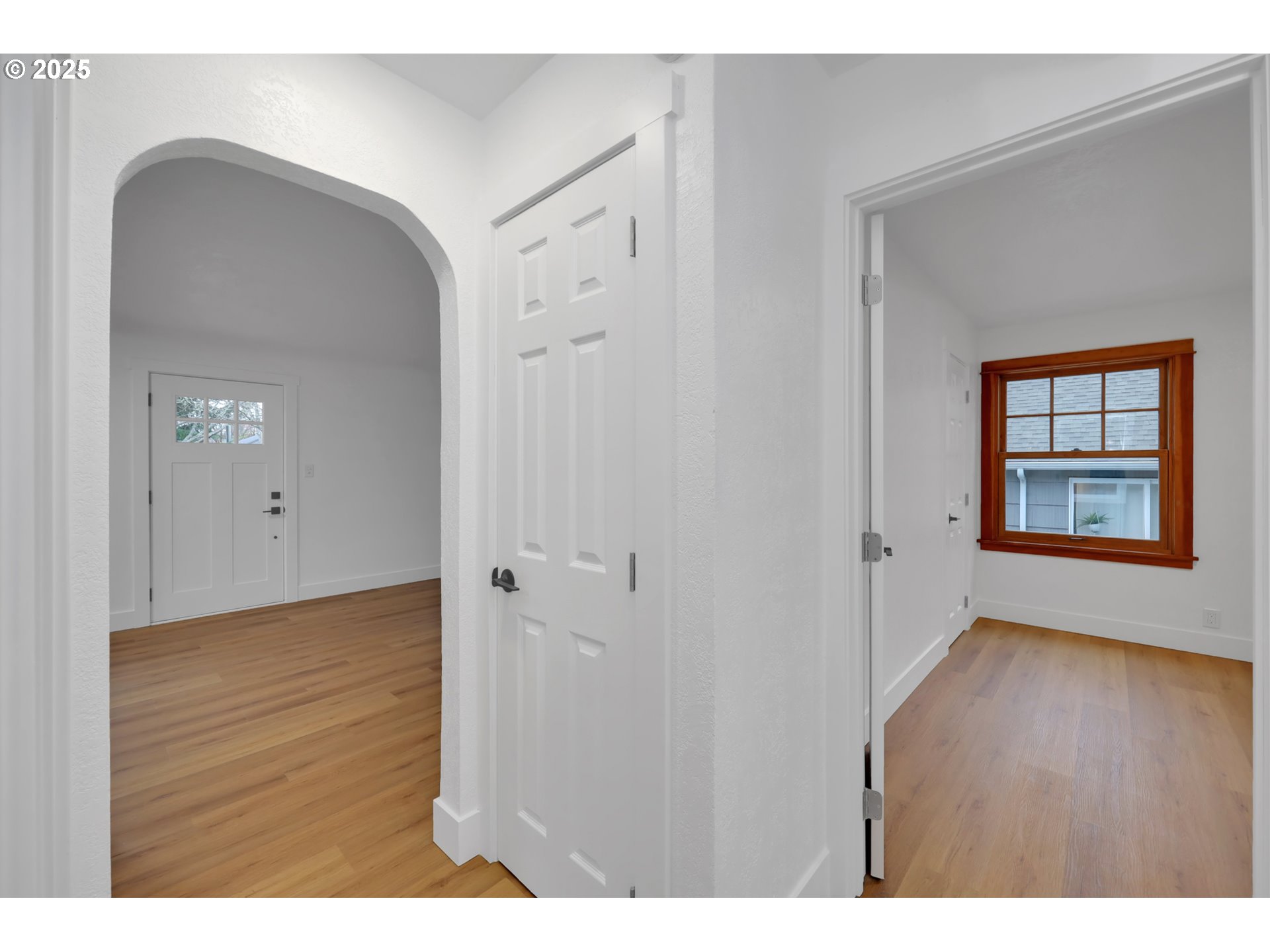 2121 Jefferson Street Eugene, OR 97405 - Photo 19 of 35 a view of an empty room with window and wooden floor