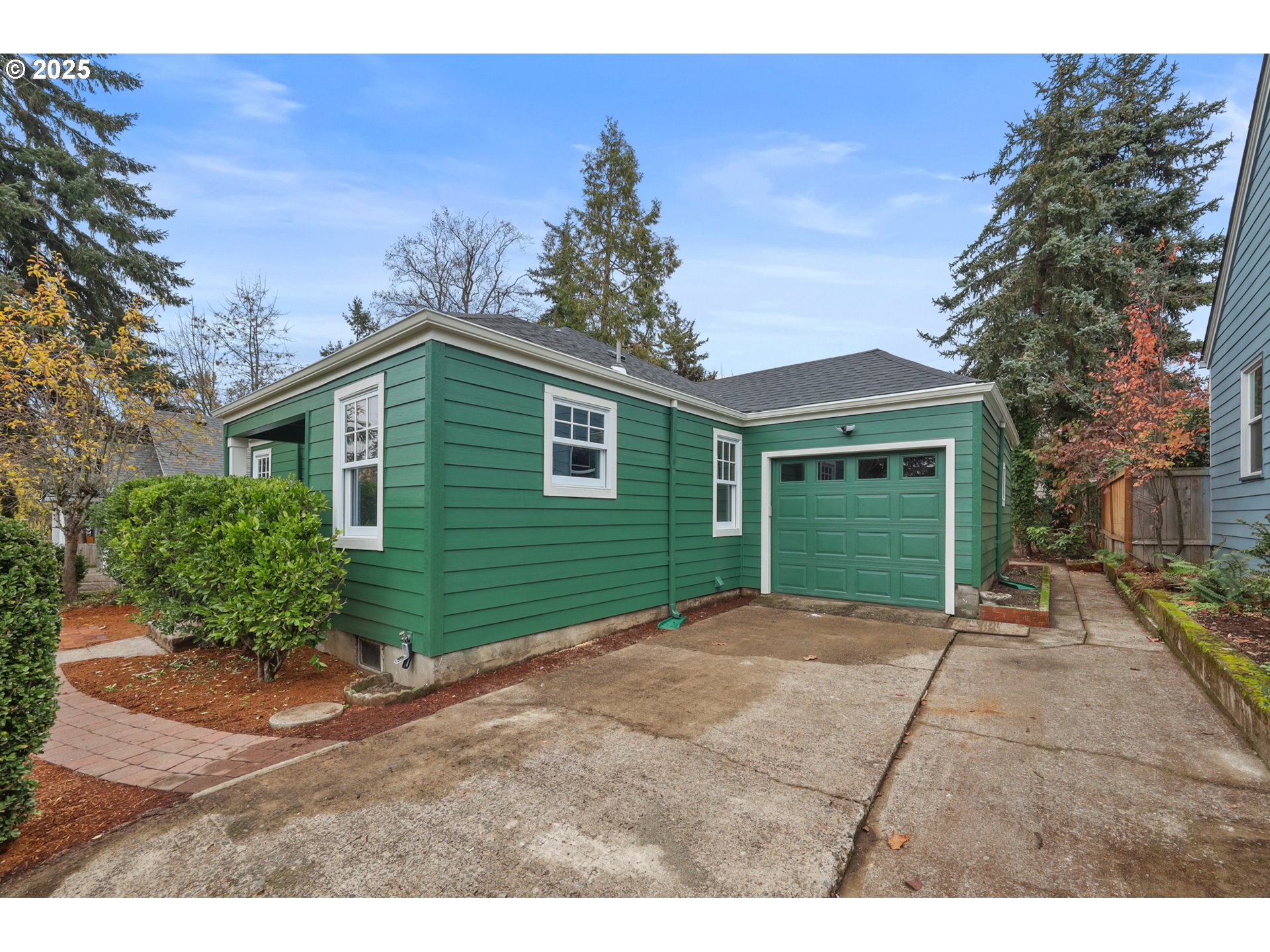 2121 Jefferson Street Eugene, OR 97405 - Photo 2 of 35 a view of a house with a yard and potted plants