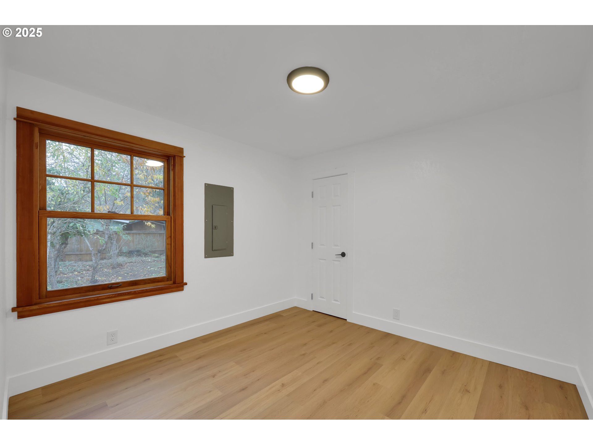 2121 Jefferson Street Eugene, OR 97405 - Photo 22 of 35 a view of an empty room with a window