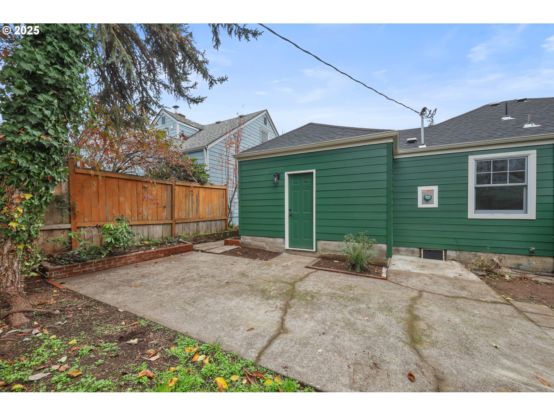 2121 Jefferson Street Eugene, OR 97405 - Photo 26 of 35 a view of a house with a yard and garage