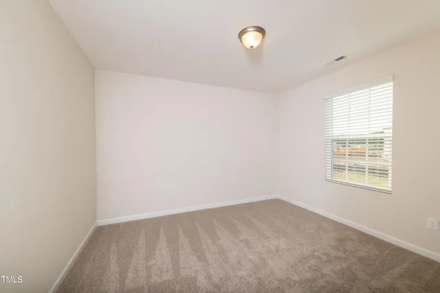 a workspace with furniture and window