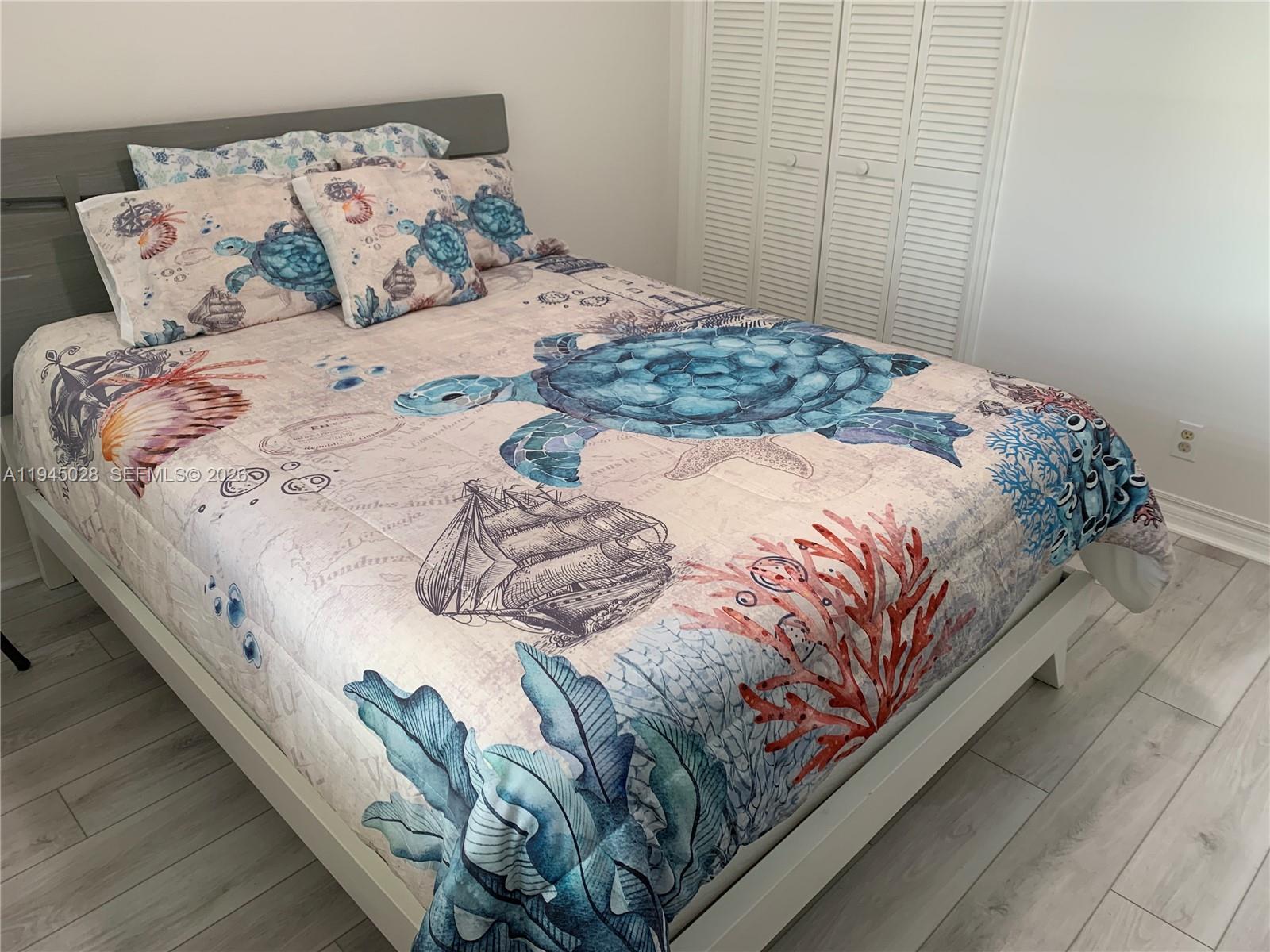 6142 Southeast Landing Way, Unit 6 Stuart, FL 34997 - Photo 17 of 51 Guest Bedroom