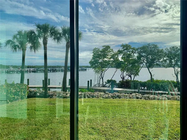 a view of a house with lake view