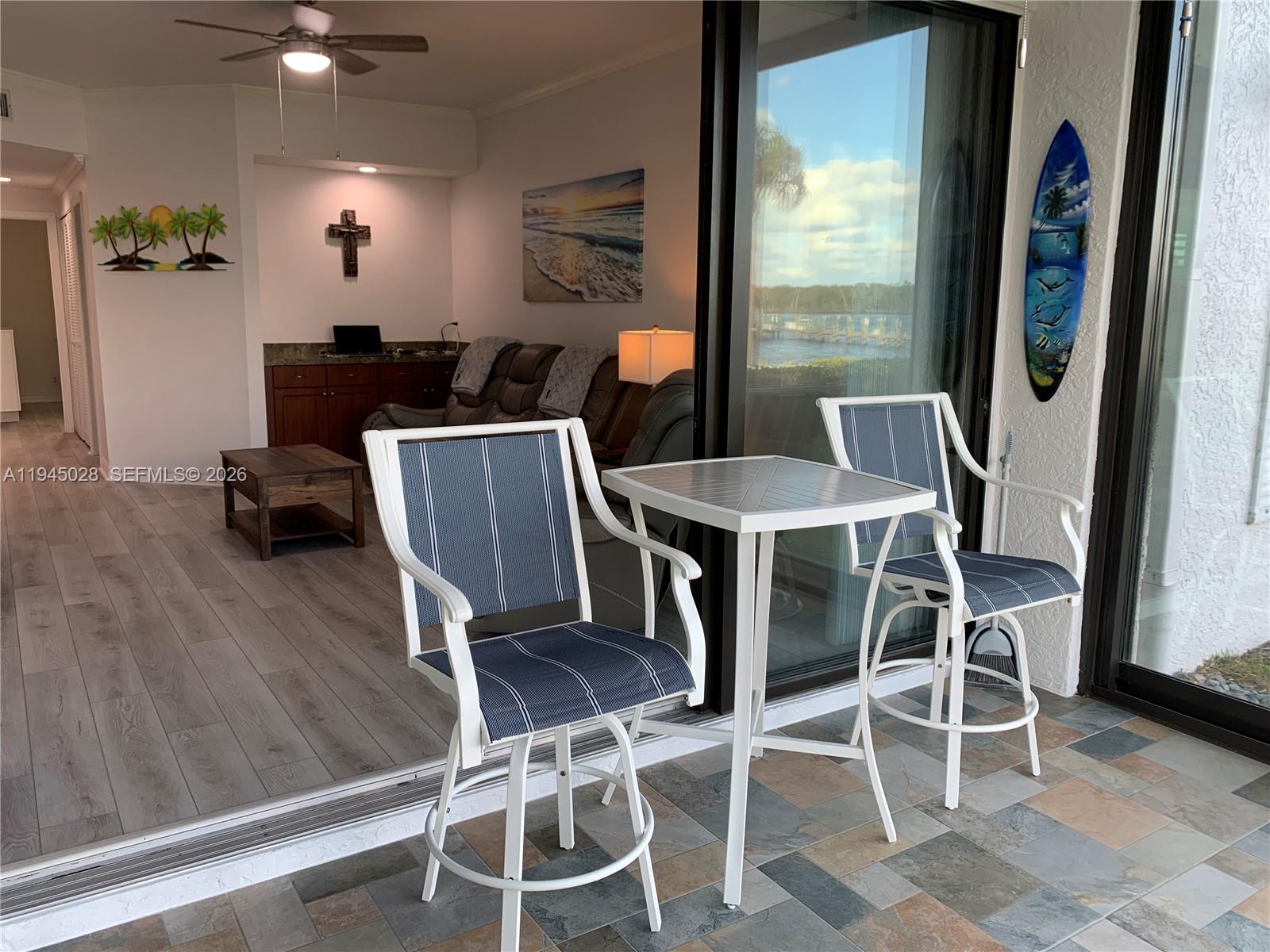 6142 Southeast Landing Way, Unit 6 Stuart, FL 34997 - Photo 35 of 51 Sun Room