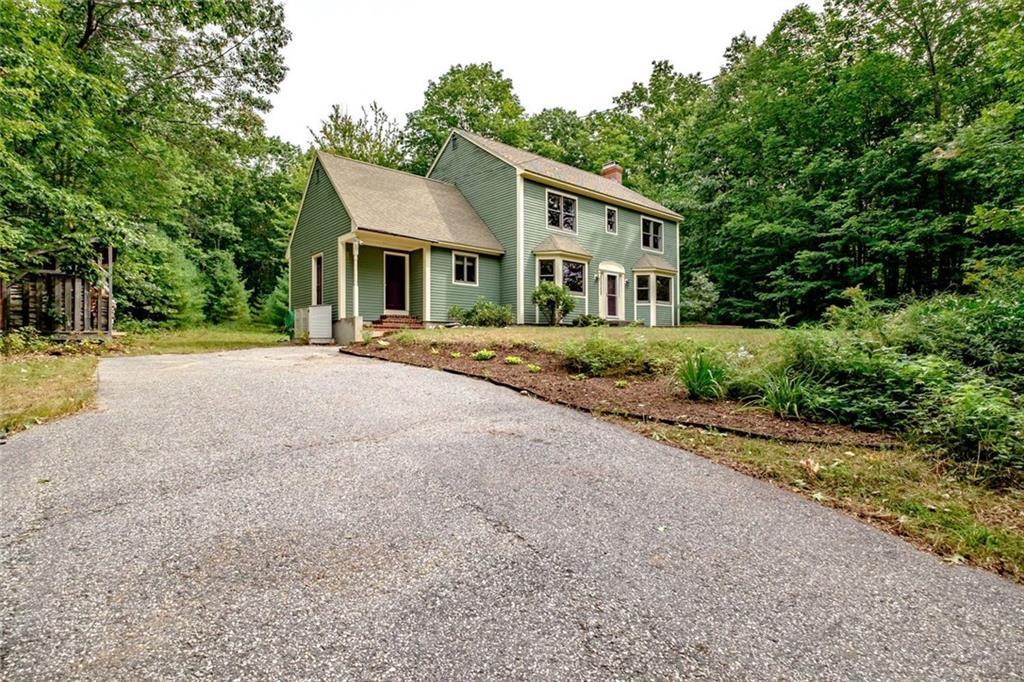 148 North Raymond Road Gray, ME 04039 - Photo 2 of 33 Set back from the road, the home...