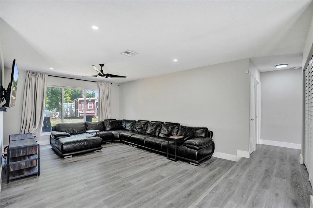 6411 Southwest 6th Street Margate, FL 33068 - Photo 17 of 48 a living room with furniture window and wooden floor