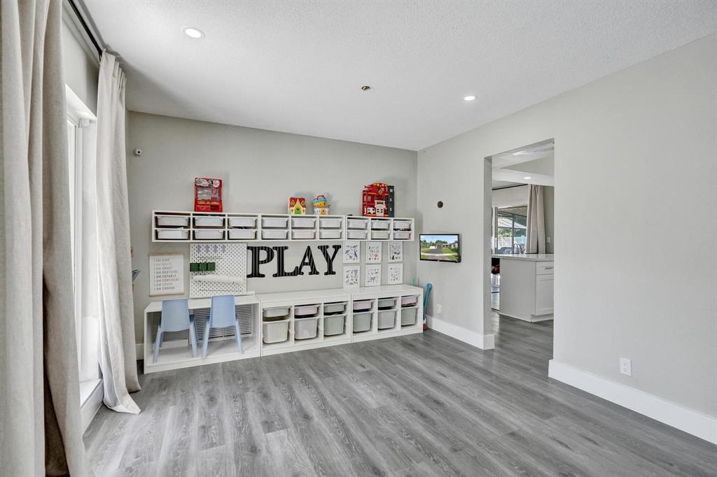 6411 Southwest 6th Street Margate, FL 33068 - Photo 19 of 48 a living room with furniture and a wooden floor