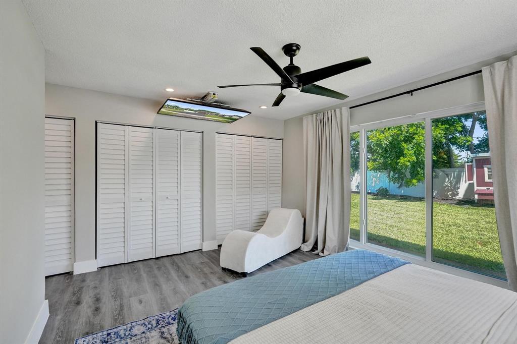 6411 Southwest 6th Street Margate, FL 33068 - Photo 22 of 48 a living room with furniture and a large window