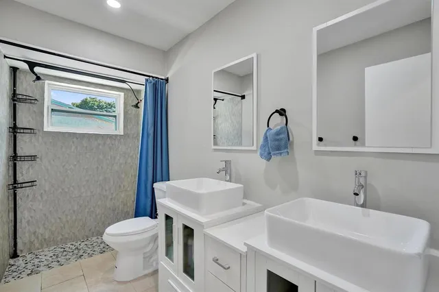 a bathroom with a sink and a toilet