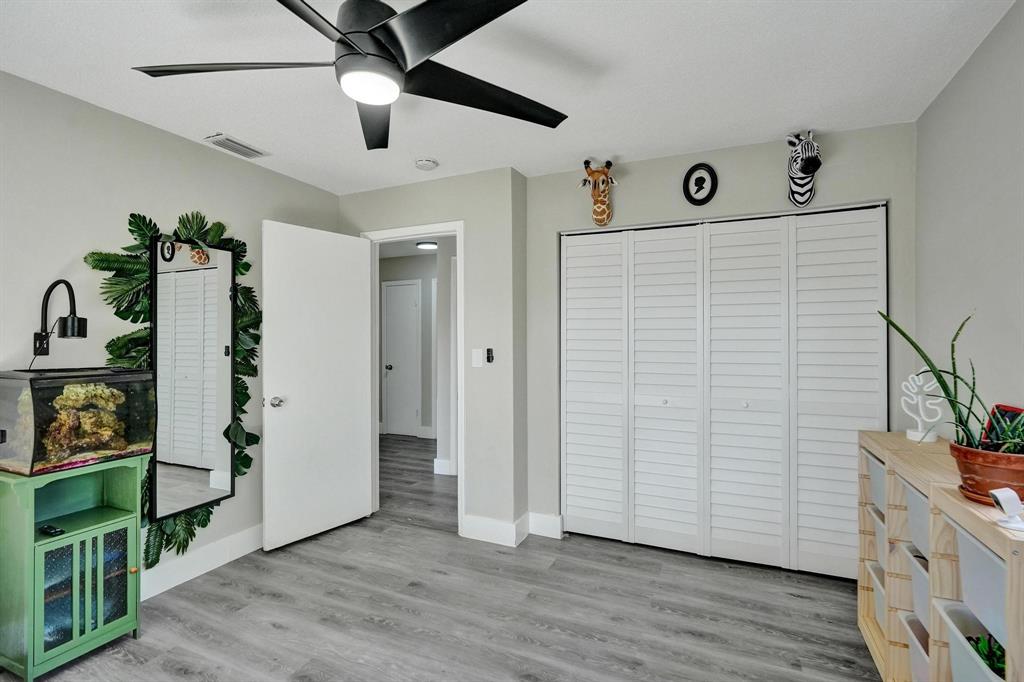 6411 Southwest 6th Street Margate, FL 33068 - Photo 30 of 48 wooden floor in an empty room