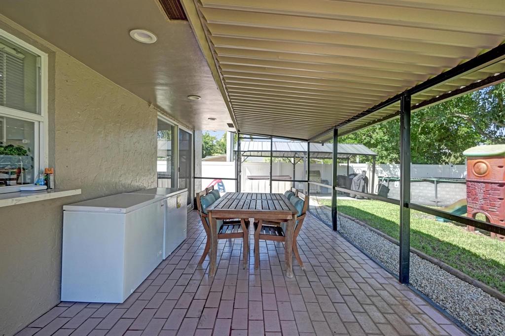 6411 Southwest 6th Street Margate, FL 33068 - Photo 33 of 48 a dining room with wooden floor