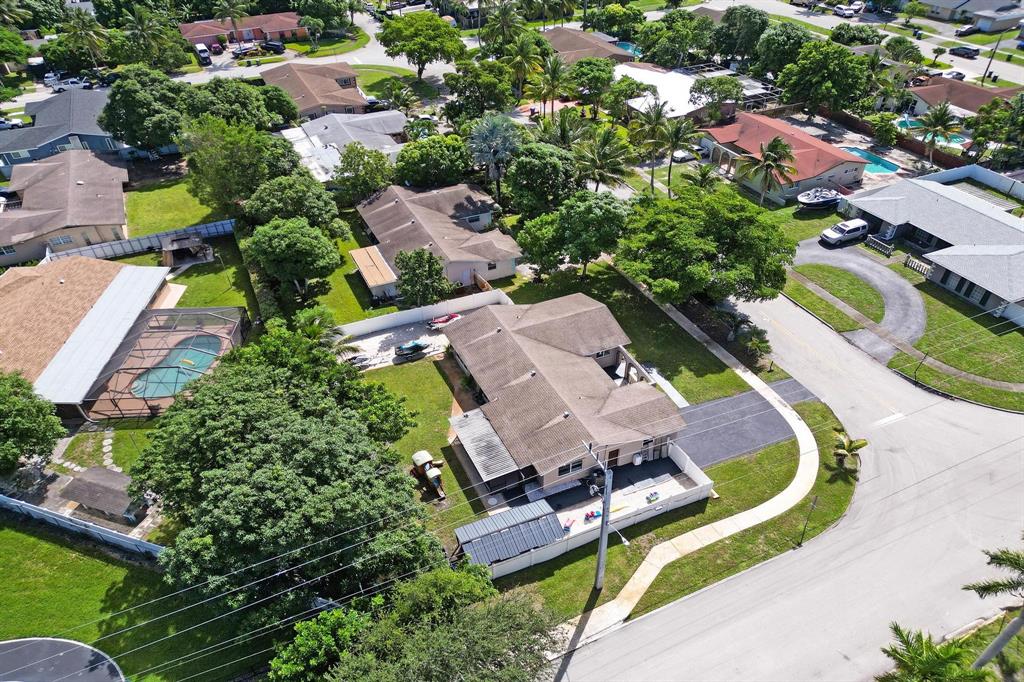 6411 Southwest 6th Street Margate, FL 33068 - Photo 45 of 48 an aerial view of a swimming pool and outdoor space