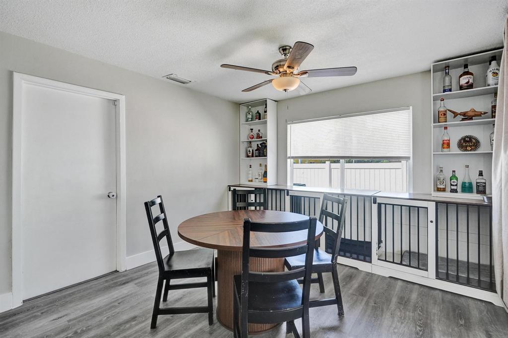 6411 Southwest 6th Street Margate, FL 33068 - Photo 5 of 48 a view of a dining room with furniture window and wooden floor
