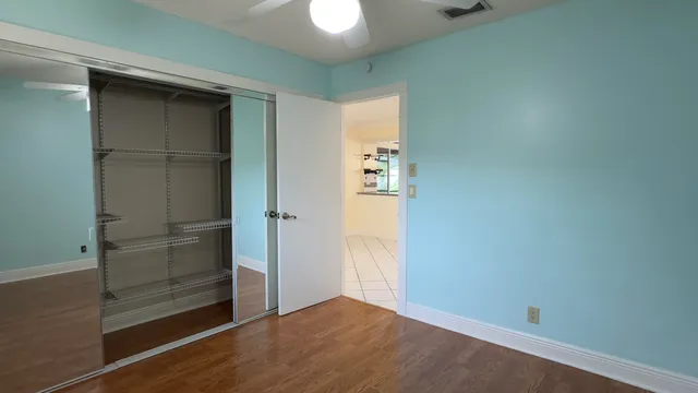 an empty room with closet