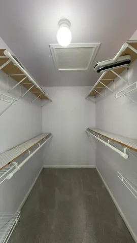 a view of a room with racks on the wall