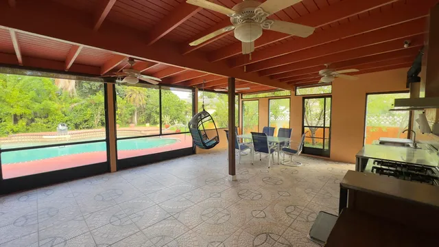 a view of an empty room with a large window