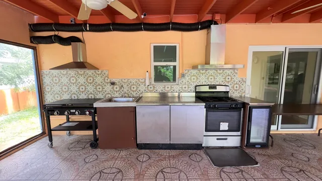 a living room with granite countertop furniture and a fireplace