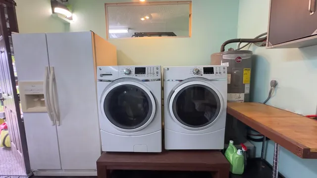 a view of hallway with washer and dryer