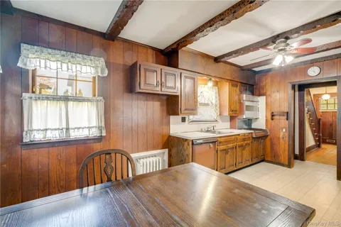 a kitchen with stainless steel appliances granite countertop a stove and a refrigerator
