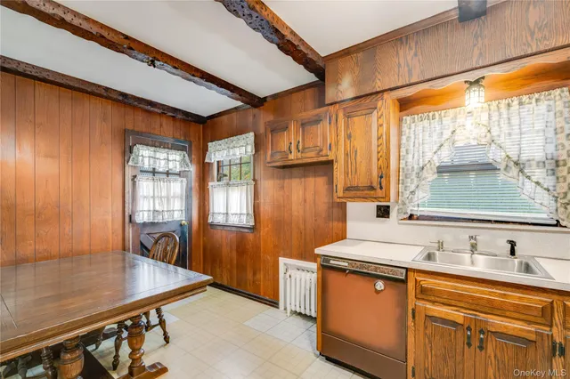 a bathroom with a sink and a large mirror