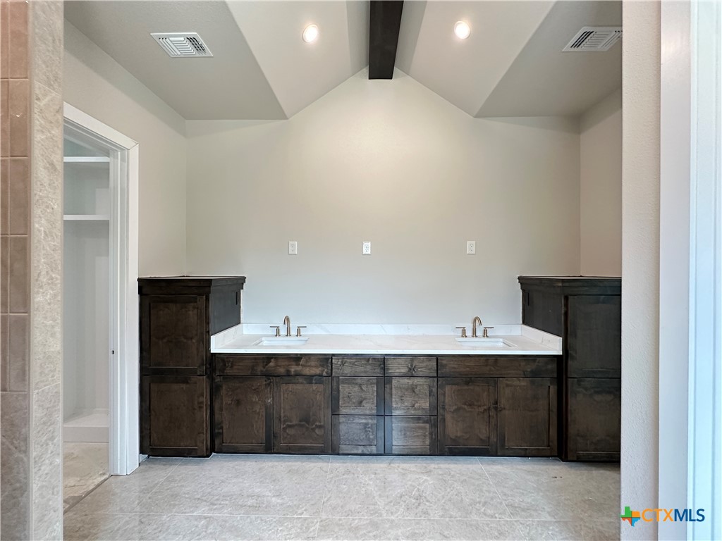 418 Dos Rios Drive Belton, TX 76513 - Photo 38 of 41 a bathroom with a sink and a mirror