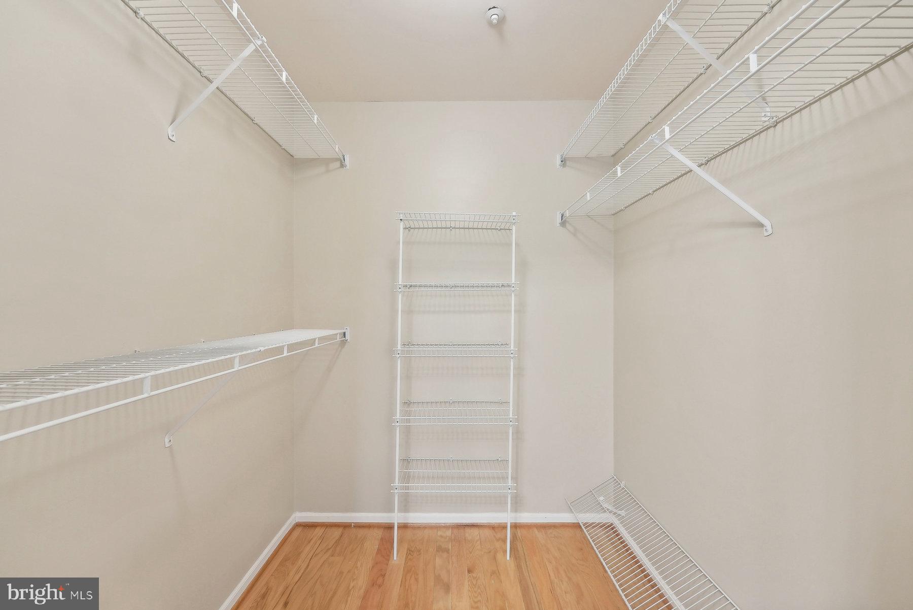 624 Brickhouse Road Princeton, NJ 08540 - Photo 16 of 35 a view of walk in closet with empty racks