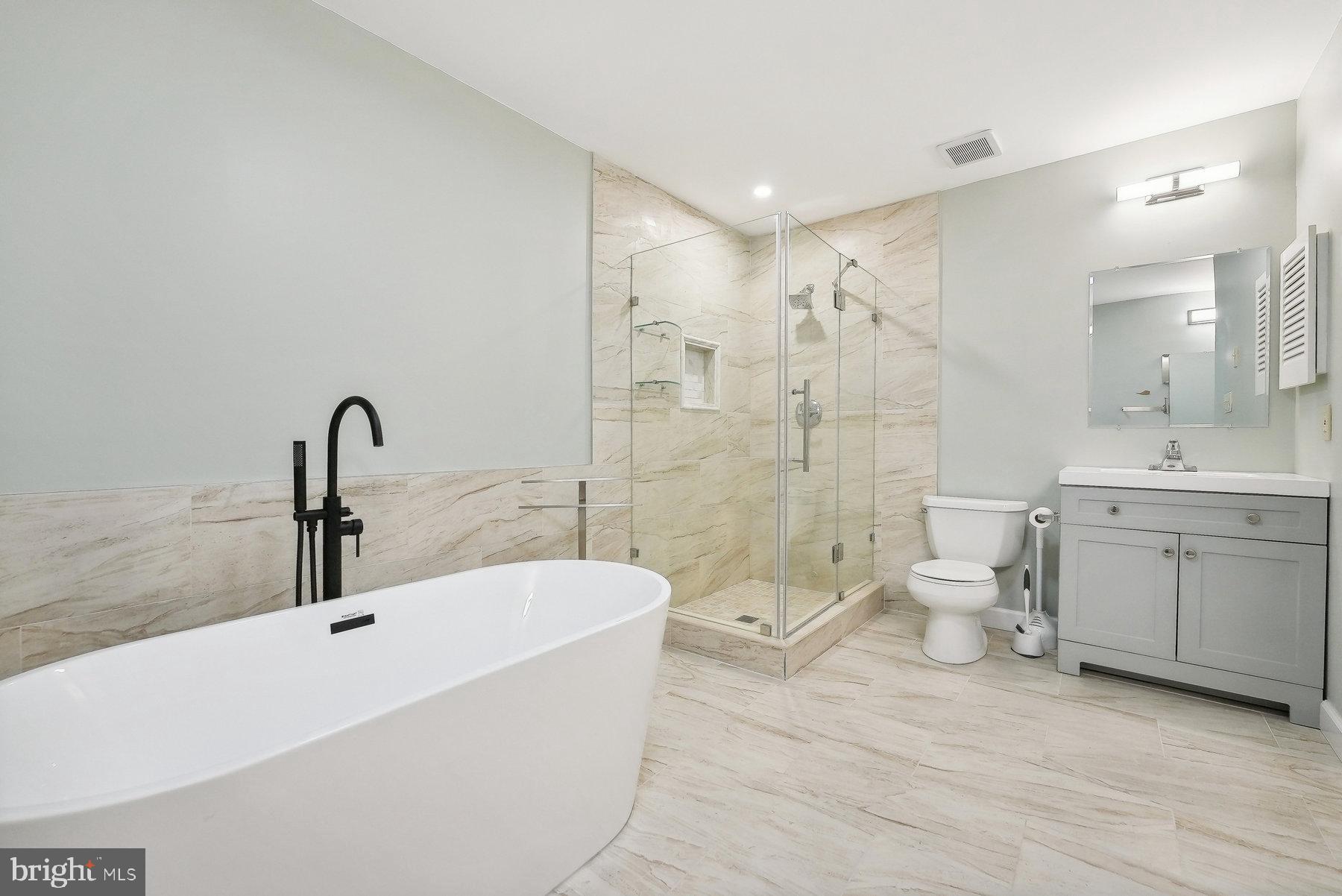 624 Brickhouse Road Princeton, NJ 08540 - Photo 17 of 35 a bathroom with a double vanity sink toilet and shower
