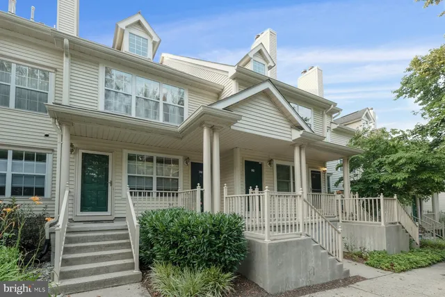 front view of a house with a garden