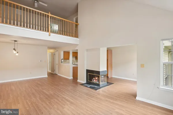 a view of livingroom with furniture and workspace