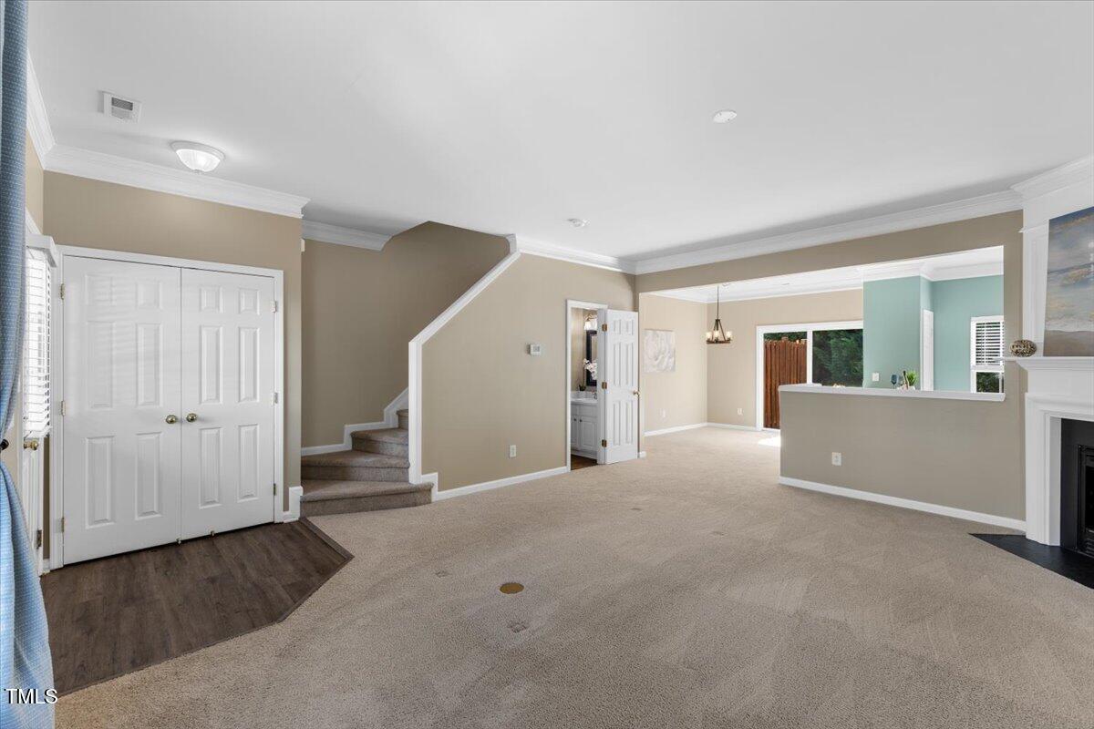8123 Rhiannon Road Raleigh, NC 27613 - Photo 8 of 47 a view of a big room with closet and windows