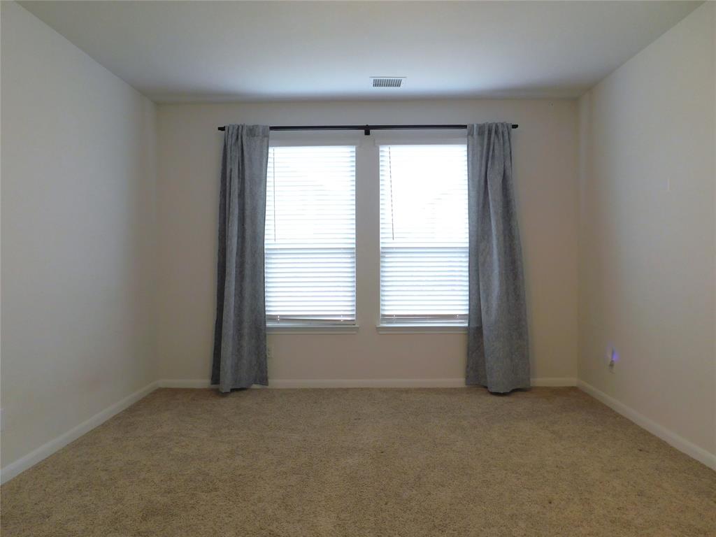 1111 Saddle Ridge Drive Aubrey, TX 76227 - Photo 15 of 35 an empty room with a window