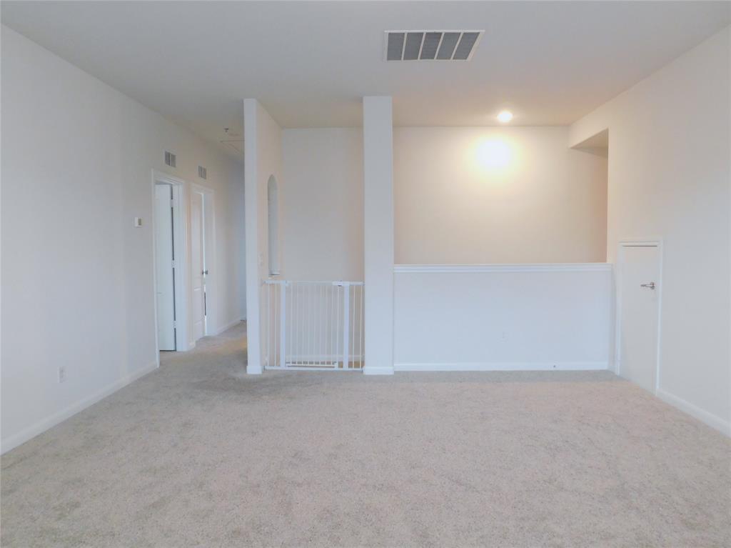 1111 Saddle Ridge Drive Aubrey, TX 76227 - Photo 20 of 35 an empty room with an entryway