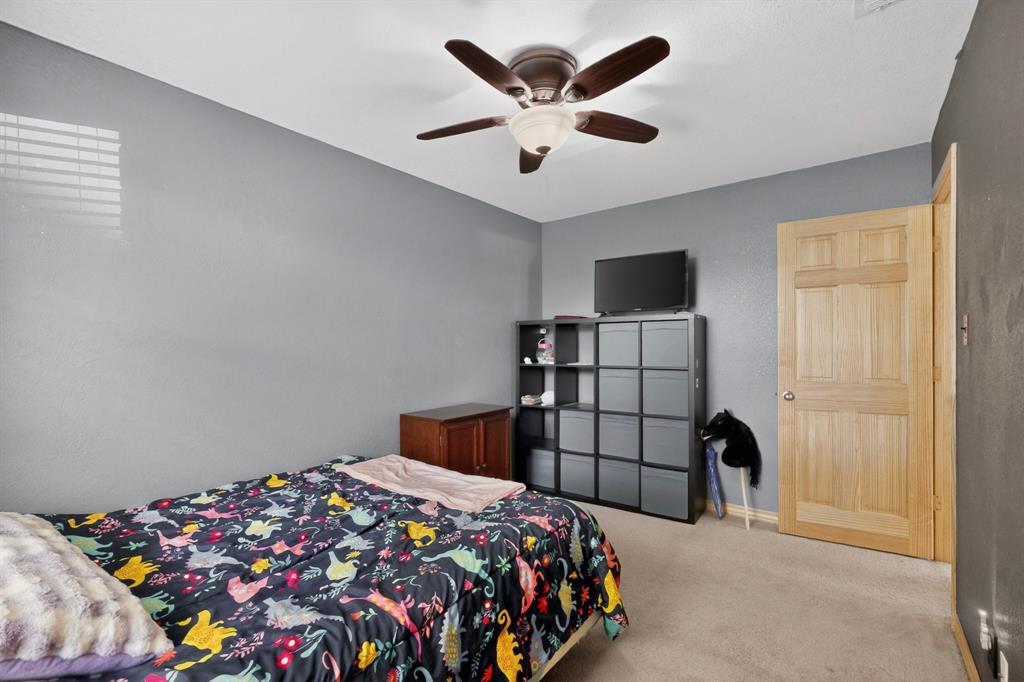 321 Redbud Street Rhome, TX 76078 - Photo 12 of 17 Secondary bedroom