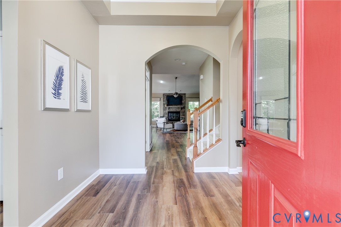 7538 South Franklins Way Quinton, VA 23141 - Photo 4 of 48 a view of a hallway view with wooden floor and staircase