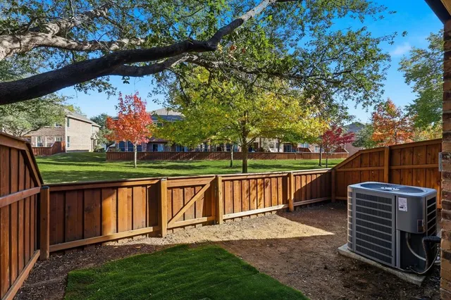 a view of a backyard with a garden