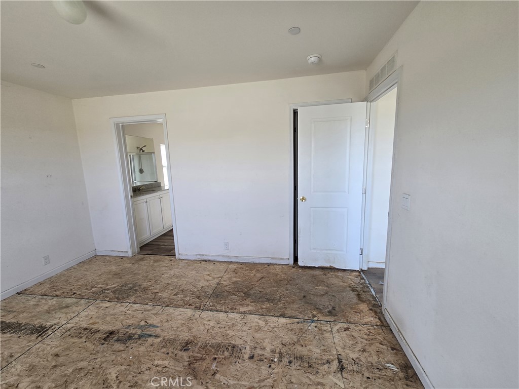 12474 Silver Rock Road Pinon Hills, CA 92372 - Photo 12 of 34 a view of an empty room