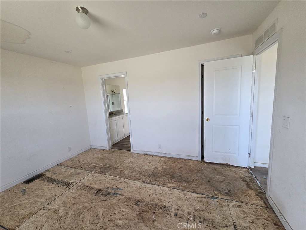 12474 Silver Rock Road Pinon Hills, CA 92372 - Photo 20 of 34 a view of an empty room