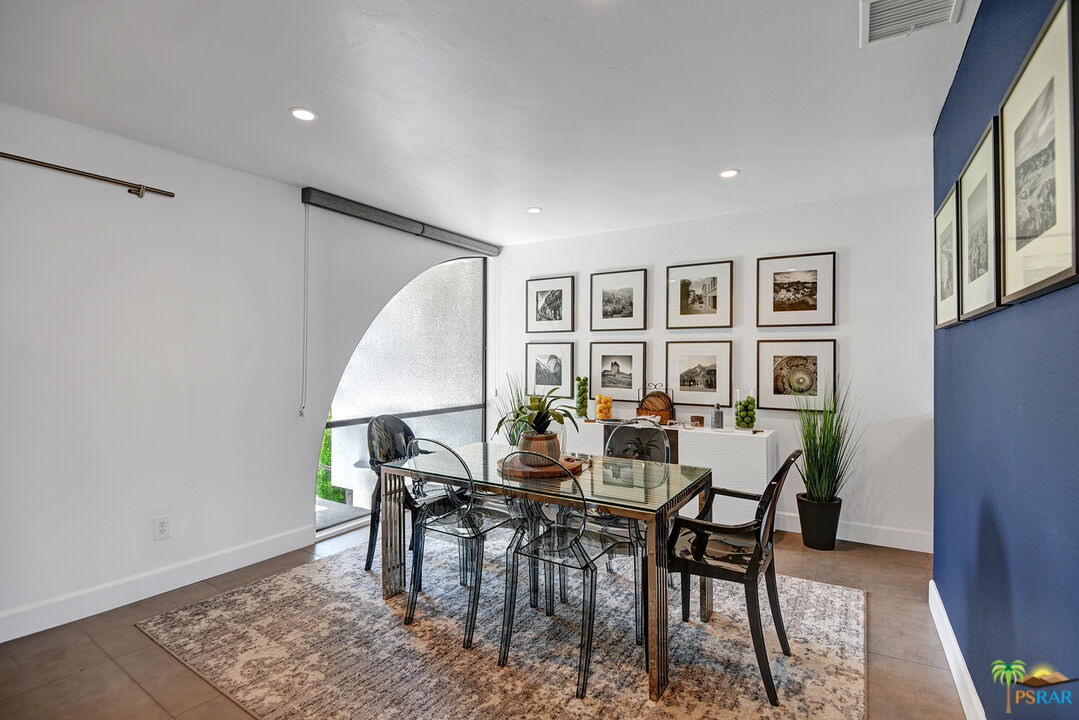 1530 North Kaweah Road Palm Springs, CA 92262 - Photo 12 of 42 a view of a dining room with furniture