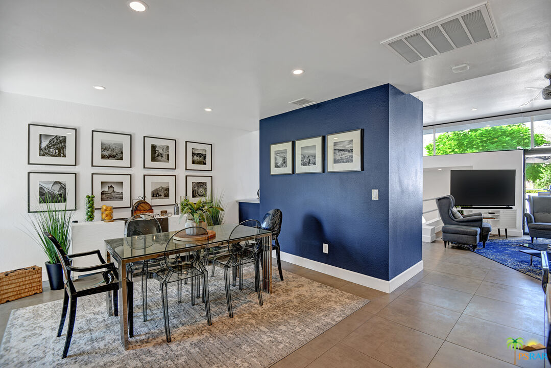 1530 North Kaweah Road Palm Springs, CA 92262 - Photo 15 of 42 a view of a livingroom with furniture and a flat screen tv