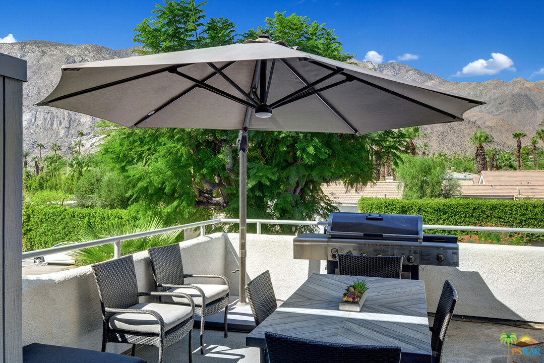 1530 North Kaweah Road Palm Springs, CA 92262 - Photo 32 of 42 a view of an outdoor sitting area