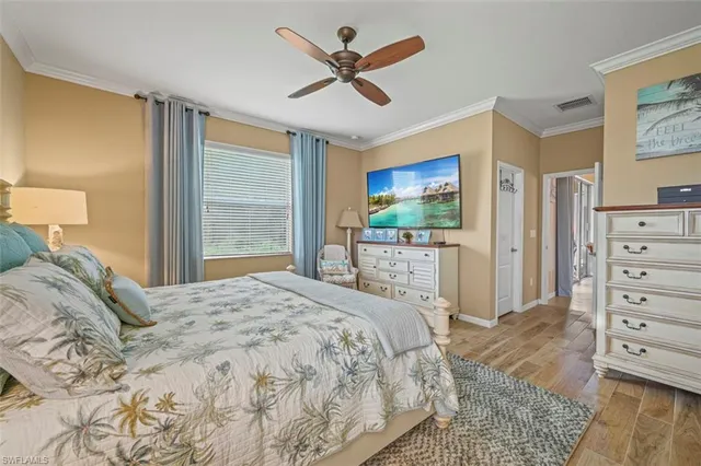a bathroom with a granite countertop sink a mirror a bathtub and shower