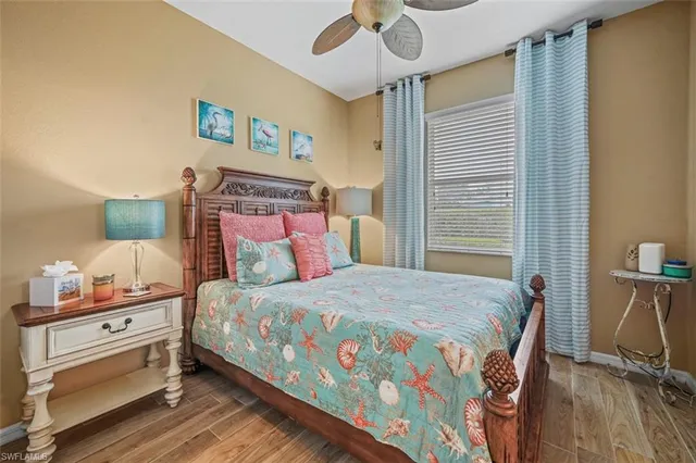 a bathroom with a double vanity sink toilet mirror and shower