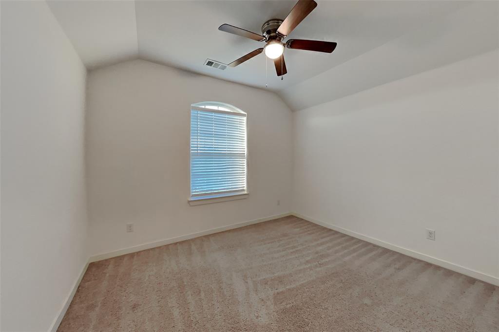 1538 Calcot Lane Forney, TX 75126 - Photo 11 of 21 an empty room with a window and a fan
