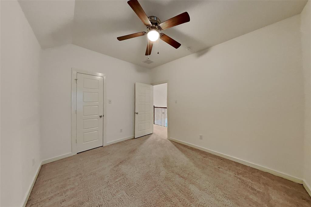 1538 Calcot Lane Forney, TX 75126 - Photo 12 of 21 an empty room with ceiling fan and window