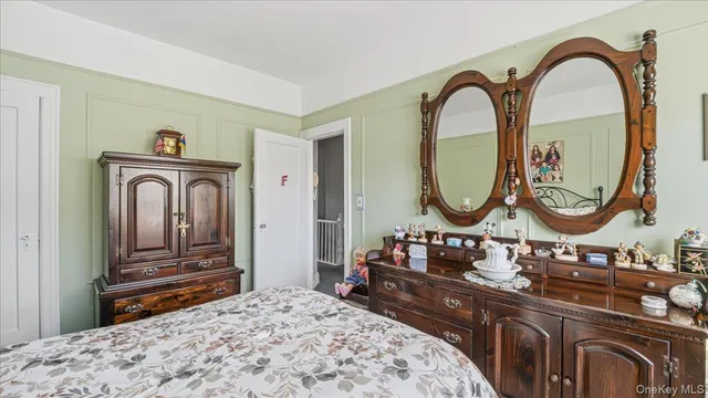 a bathroom with a sink a mirror and a window