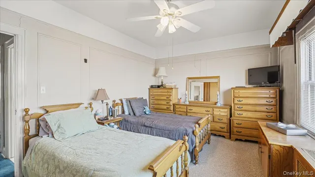 a bedroom with a bed and furniture