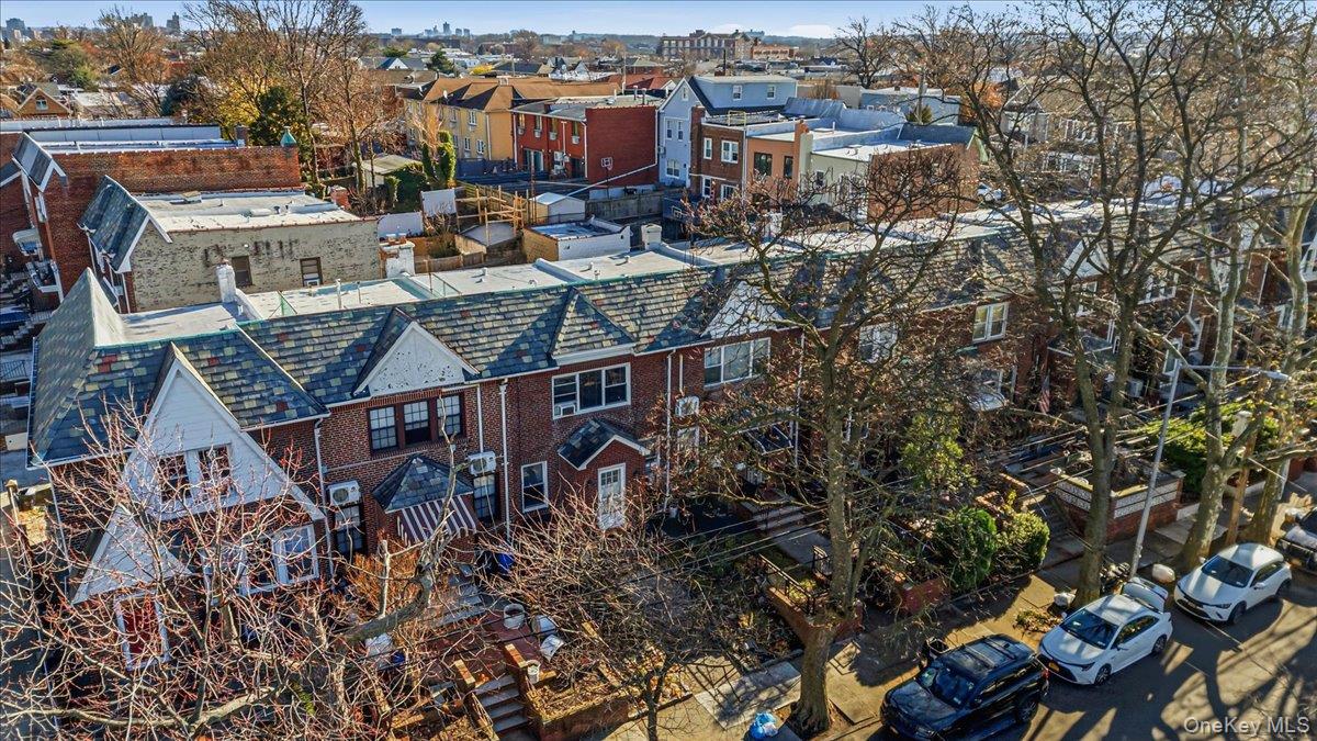 52-61 66th Street Queens, NY 11378 - Photo 21 of 26 an aerial view of a building with outdoor space and seating area