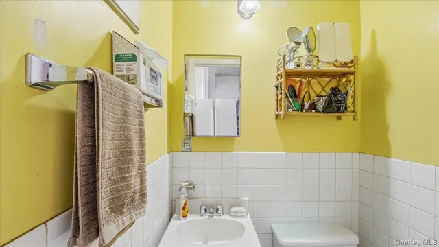 a bathroom with a sink and mirror