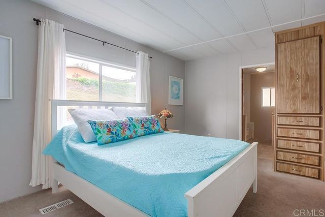 a view of kitchen center island and living room